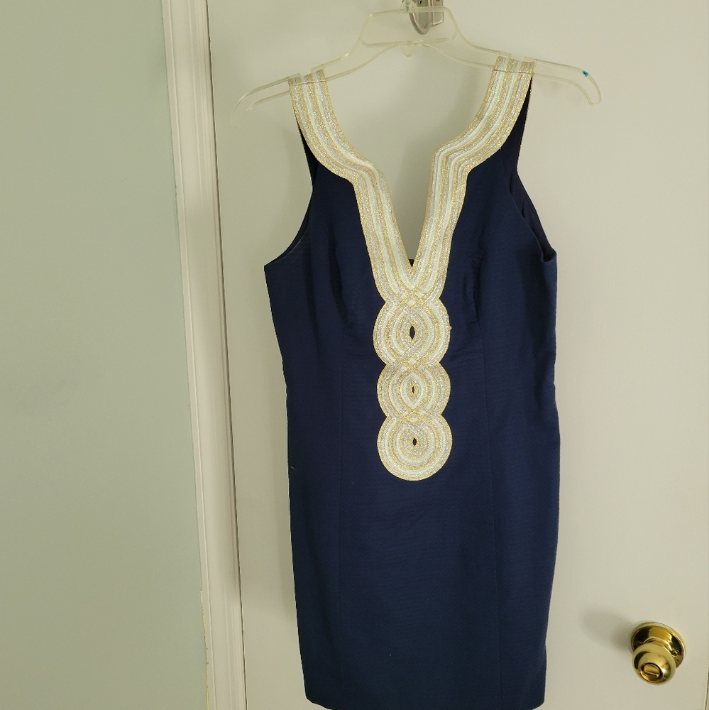 Lilly Pulitzer Sleeveless Dress with gold and white detail around the front.